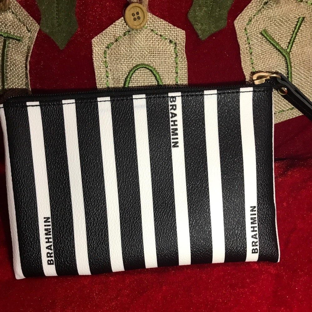 NEW Brahmin wristlet with black and white stripes.